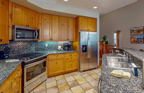 Steamboat Springs House | Large open floor plan w/private deck w/shared pool, hot tub & winter shuttle