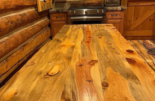 Vail Cabin | Lena's Cabin in Vail is nestled right beside Gore Creek, minutes from skiing.