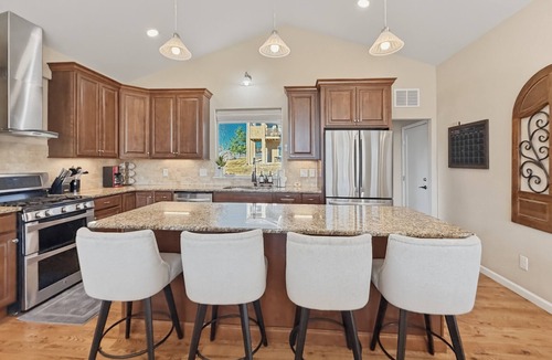 Gleneagle House | Located just 10 minutes from the Air Force Academy and with a breathtaking view of the mountains; Rampart Vista is sure to wow you! Spend your day enjoying a USAFA event and end it with the family enjoying a game in our open concept living area.