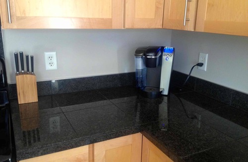 LoDo Condo | Luxury 2-Bed Riverfront Lodo. Great location, large Deck, 77" TV. On the Creek.