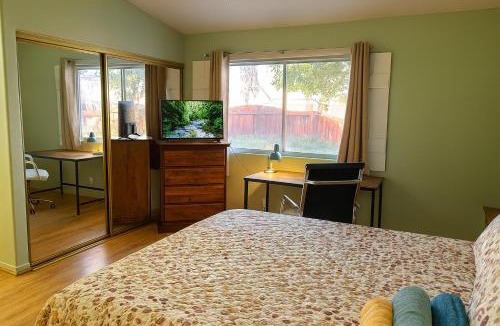 Hemet House | Meadow Harvest Suite with TV and private bathroom