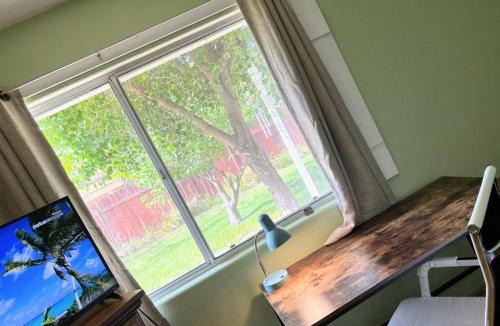 Hemet House | Meadow Harvest Suite with TV and private bathroom
