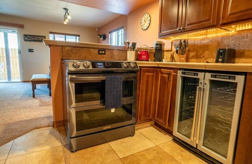 Colorado Springs Condo | Minutes from Everything | Hot Tub | Grill | Views | King Bed