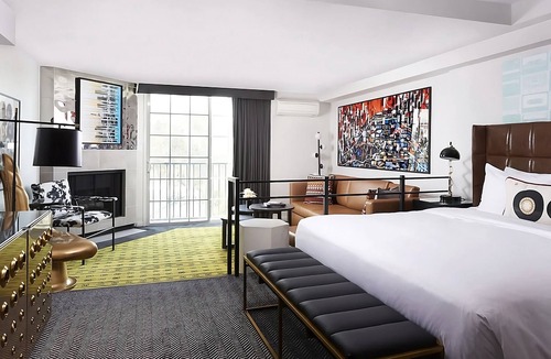 Norma Triangle Hotel | Modern 2 Units w/City Views, Rooftop Pool & Pet-Friendly Escape