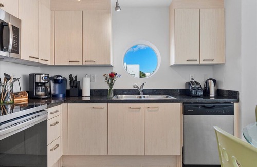 South of Fifth Condo | Modern Luxury Only Steps To The Sand! Huge Patio Deck, Modern Artwork & Extras