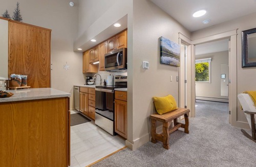 Estes Park Condo | Mountain Pines Chalet: Nestled along Fall River