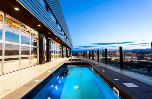 River North Art District Hotel | Mountain View Suite at The Source Hotel, Outdoor Pool, Pets Allowed