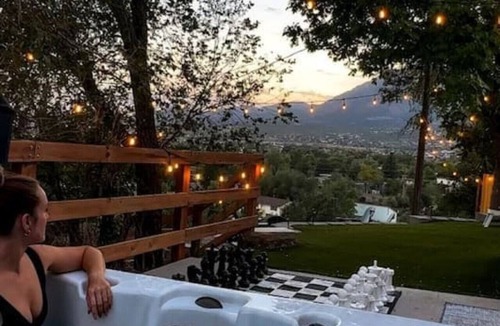 Cheyenne Meadows Apartment | Mountain Views ~Climbing wall ~Mini Golf ~Hot tub