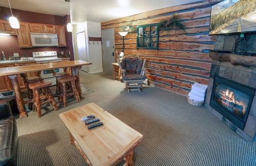 Estes Park Condo | One Bedroom, Two Bath Condo with a Personal Hot Tub on Deck Overlooking River