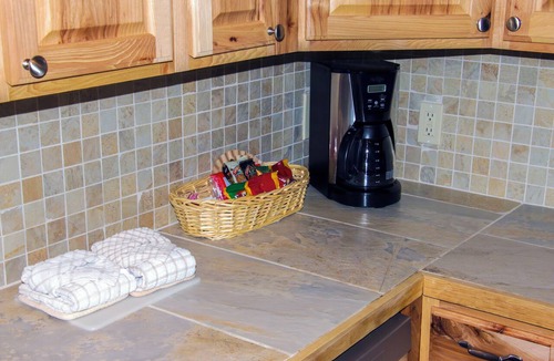Estes Park Condo | One Bedroom, Two Bath Condo with a Personal Hot Tub on Deck Overlooking River