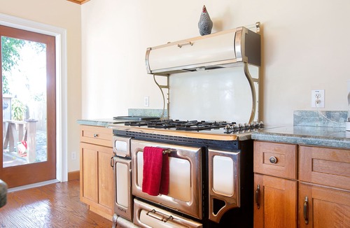 Parrot Cove House | Palmway Tropical Oasis - Heated Pool, Beach & Golf