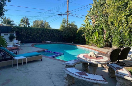 Brea House | Piazza Room at the Oasis Patio Pool House
