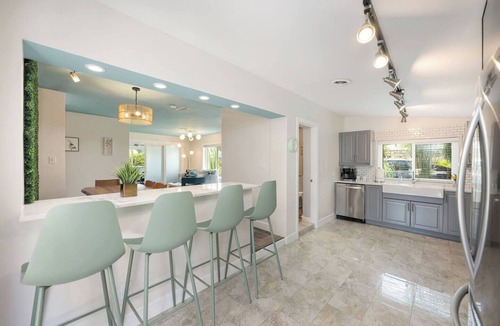 Poinsettia Heights Villa | Poinsettia Palms! Giant Heated Pool! Hot Tub, Fire Pit, PuttngGreen, N64, IceBath, Gym!