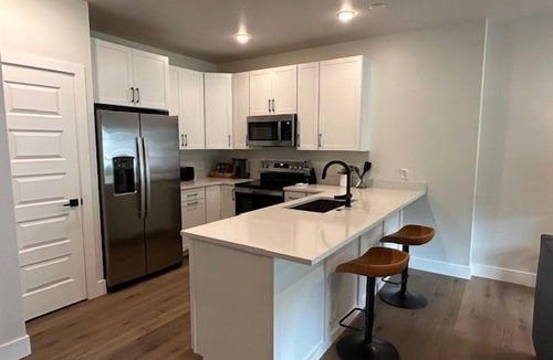 Lakeside Village Apartment | Premier 1BR + Den w/Pool & Hot Tub Access