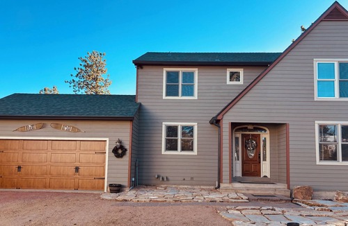 Divide House | Rangeview Mountain Retreat- tucked into the woods with views of Pikes Peak!