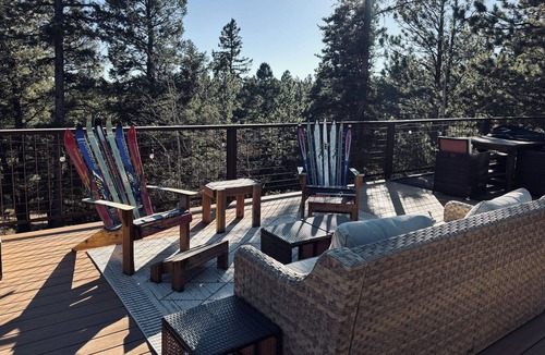 Divide House | Rangeview Mountain Retreat- tucked into the woods with views of Pikes Peak!