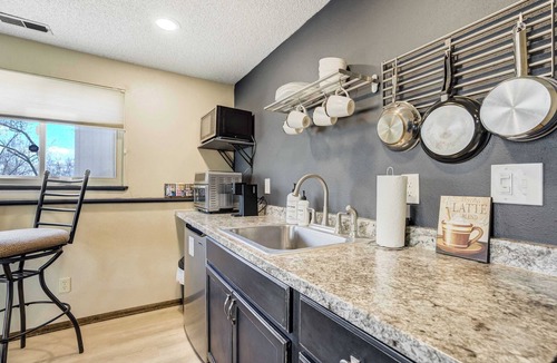 Cheyenne Meadows Apartment | Ravine Row! Cozy Getaway w/Hot Tub & Backyard