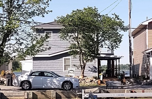 Russells Point House | Renovated Waterfront House with MASSIVE boat house and party deck