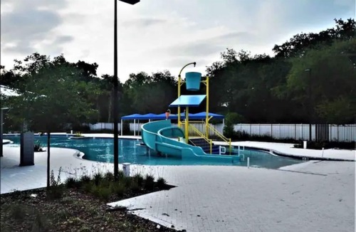 Riverview House | Riverview Oasis Pool, Spa & Family Arcade Fun