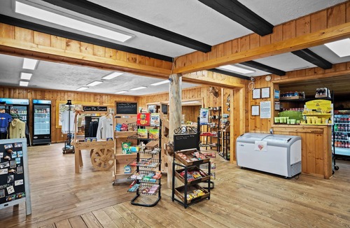 Almont House | Rustic Luxury Meets Nature: Cabins, Fishing & Mountain Adventures