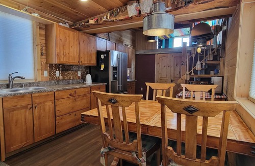 Laramie Cottage | Rustic Wyoming Lake Cottage with Mountains Views.