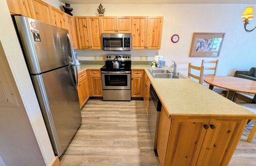 River Run Condo | Scenic Summer Stay | Balcony, Pool & Mini-Golf