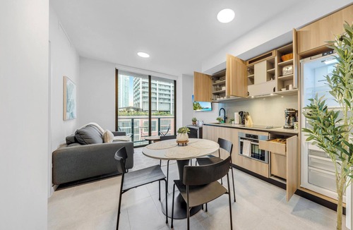 Downtown Miami Apartment | Sleek 1-BR & Den in Central Downtown