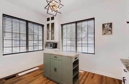 West Colfax House | Sloan’s Sweet Spot: 2BR Hideaway Near the Lake
