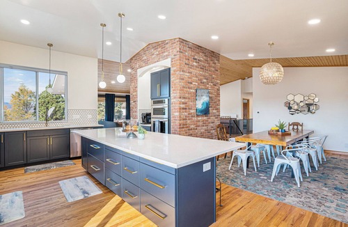 Park Vista House | 🏡Spacious 6-bedroom retreat sleeping up to 23, perfect for groups and family getaways. Enjoy a private hot tub, sauna, pool table, and cozy outdoor firepit—plus a backyard playset for kids to make unforgettable memories.