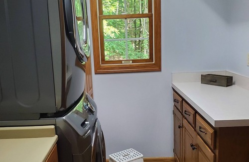 Killbuck House | Spacious home! Large deck, patio, waterfalls, koi pond, hot tub & massage chair!