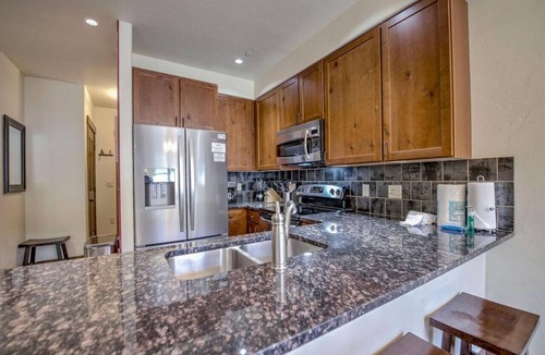 Copper Mountain Village Condo | Steps to Skiing! Modern 2BR Retreat w/Deck, Garage & Fireplace