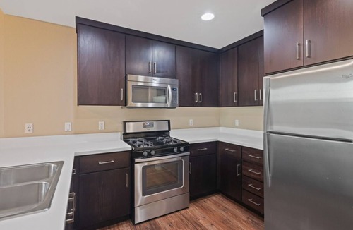Pilgrim - Triton Condo | Stylish 2BR Plaza Retreat with Pool