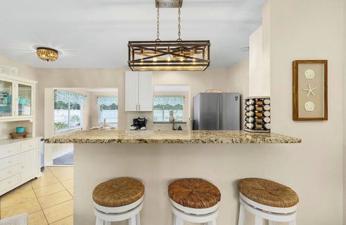 Central Naples House | SwimSpa | Oasis Backyard | Beach 1.5 mi | Monthly Stays