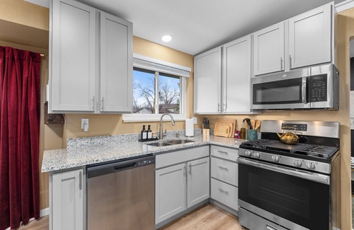 Arvada House | The Backyard Movie, Hot Tub & 2 Game Rooms