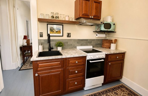 Canon City House | The Greenwood Loft -Historic Charm, Modern Comfort