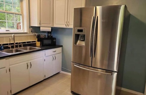 Akron House | The White House w/Hot Tub Portage Lakes Fenced Yard Pet-Friendly!