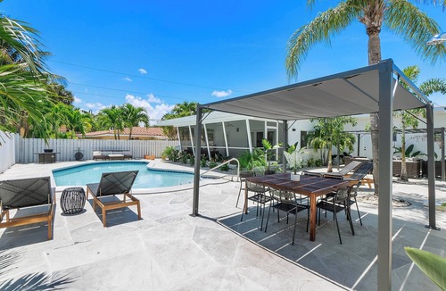 Dolphin Isles Apartment | Trendy Modern Haven, Just Steps from the Sea