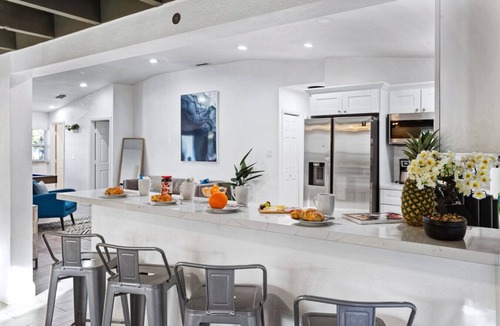 South Corals House | Tropical Oasis RetreatI Luxe Pool + Arcade Getaway