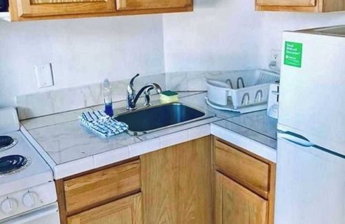 Pompano Beach Hotel | Two double bed studio with full kitchen on 2nd floor .