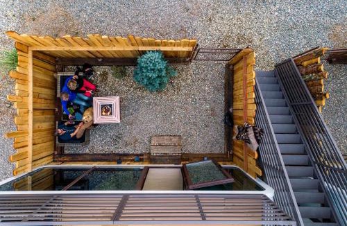 Taos House | Unique Tiny House Space Cabin with Rooftop Patio and 360° Mountain Views near Taos, New Mexico