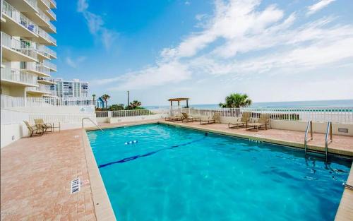 Seawinds Condo Apartment | Updated direct oceanfront 2/2, corner condo with private balcony, heated pool and garage