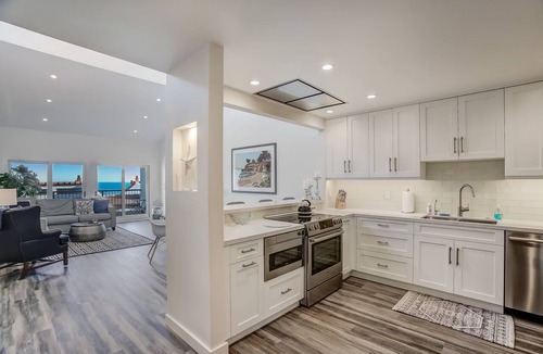 East Mesa Condo | Updated Penthouse! Steps from the sand at Leadbetter Beach, pool, spa, BBQ and more!