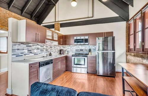 Tremont House | Urban Industrial Penthouse | Game Room Pool Table
