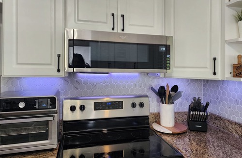 Central Corals Villa | Villa in Fort Lauderdale Waterfront Heated Salt Pool Tiki Free EV charging Kayak