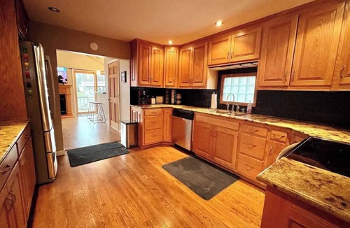 Russells Point Cottage | Waterfront Cabin: Hot Tub, Game Room & Fire Pit