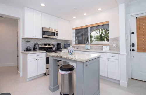 South New River Isles House | Waterfront Haven! 4BR/2.5BA + Solar Heated Pool
