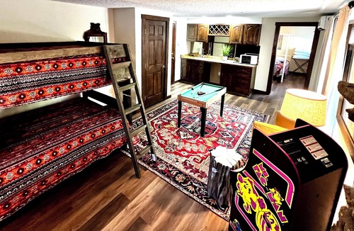 Northeast Colorado Springs House | Wooded Retreat Hot Tub. Private Arcade, Yard Games, Sleeps 12 , 7 Beds, 2Kings