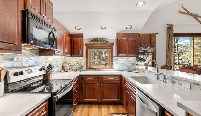 3 Ensuite Bedrooms, Private Garage, On Main St.