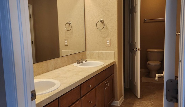 A private bedroom with a private bathroom