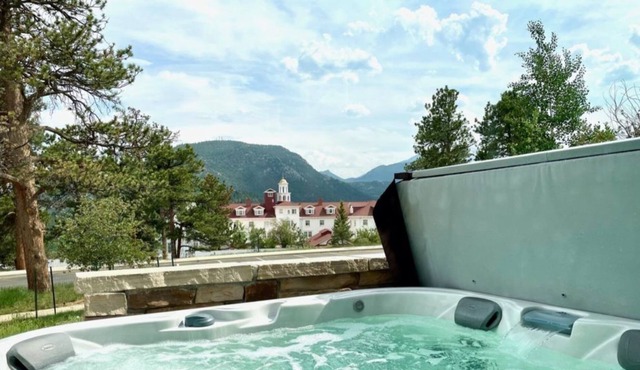 Condo w/ breathtaking views of the Rockies, patio w/ outdoor hot tub! #311